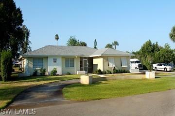 1204 E 3rd ST, LEHIGH ACRES FL 33936