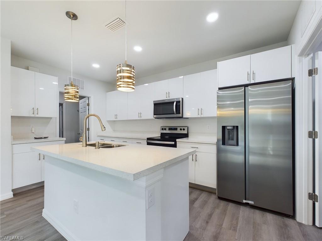 1406 Ford CIR, LEHIGH ACRES FL 33936