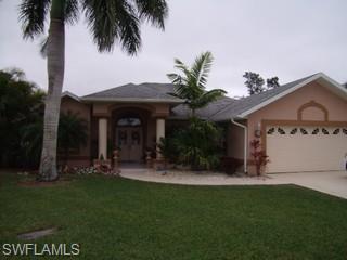 6184 WOODSTONE DR, NAPLES FL 34112