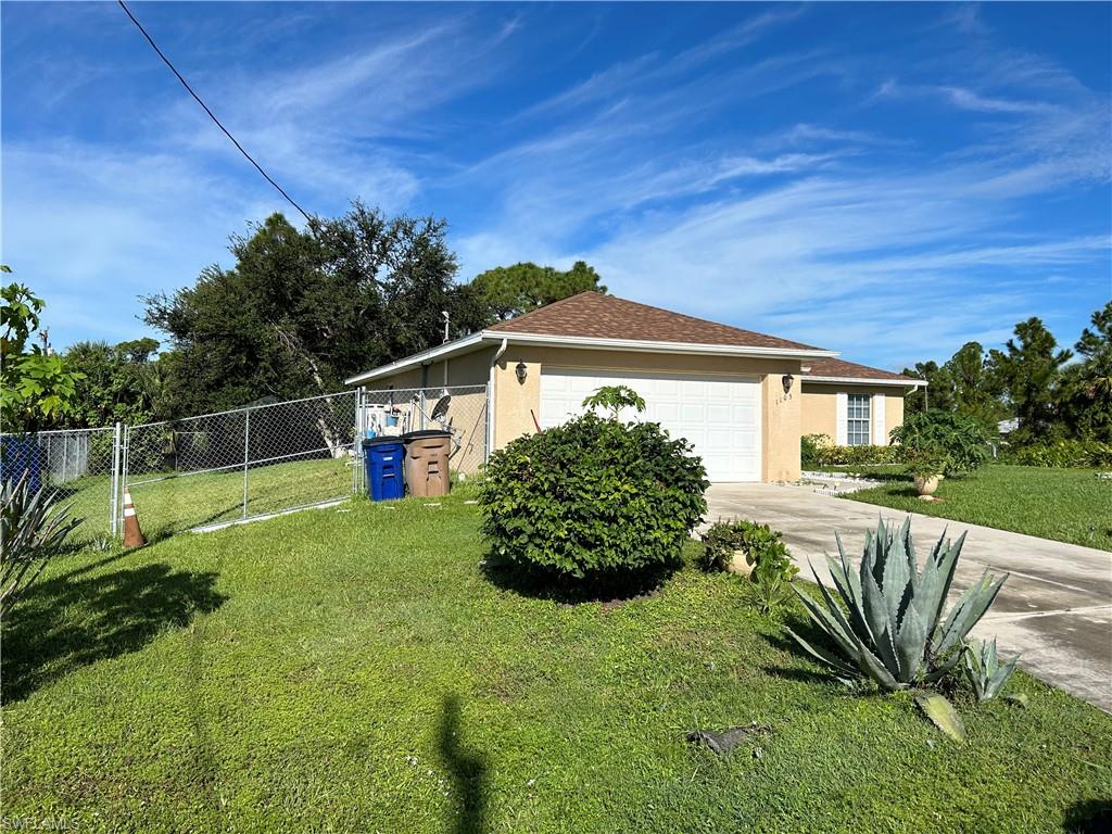 1103 Lee AVE, LEHIGH ACRES FL 33972