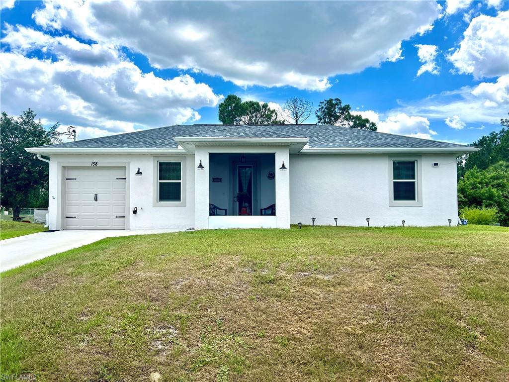 158 Thornton AVE S, LEHIGH ACRES FL 33974