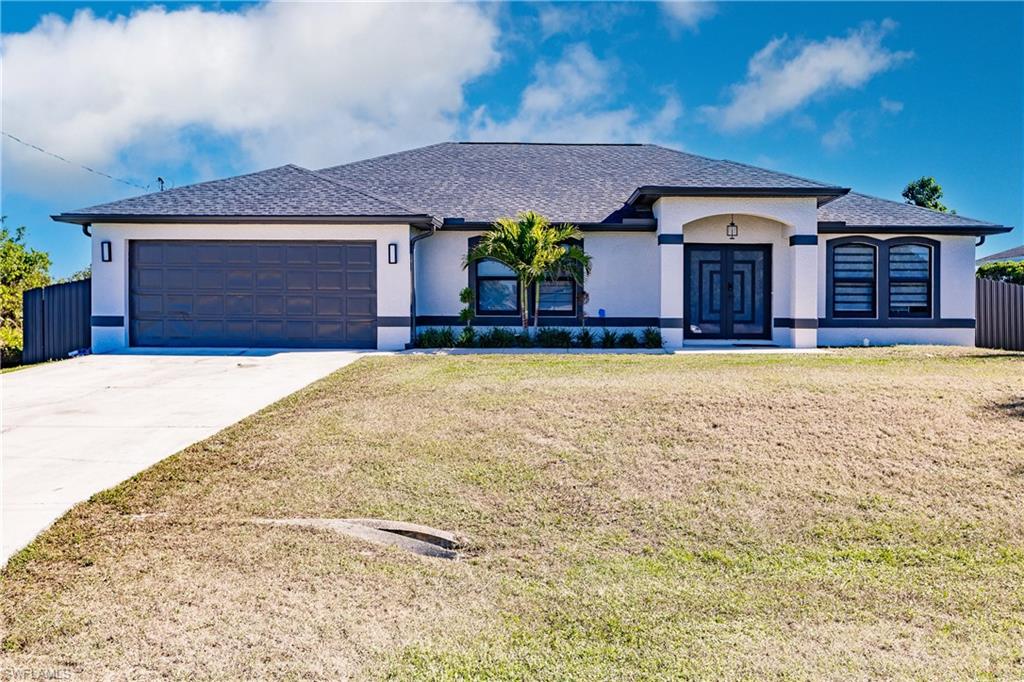 327 Rawlings AVE, LEHIGH ACRES FL 33974