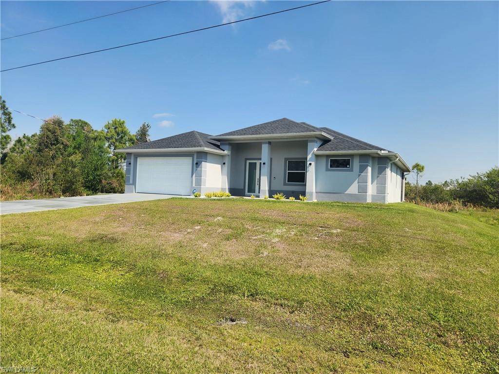 406 Muriel ST, LEHIGH ACRES FL 33972