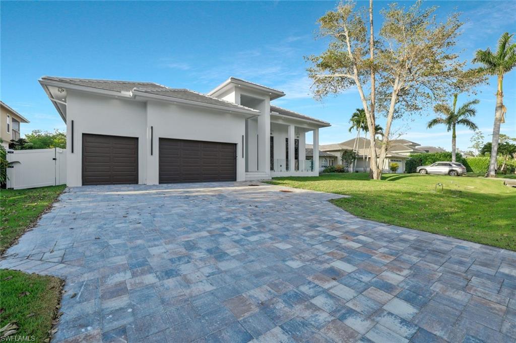1317 Cypress Woods DR, NAPLES FL 34103